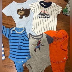 Set of five various baby boy onesies
